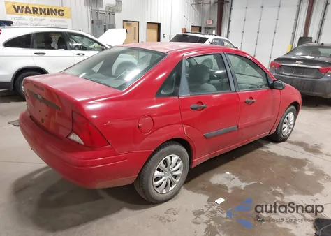 2002 Ford Focus Lx z USA, uszkodzony, nr VIN 1FAFP33P42W291849